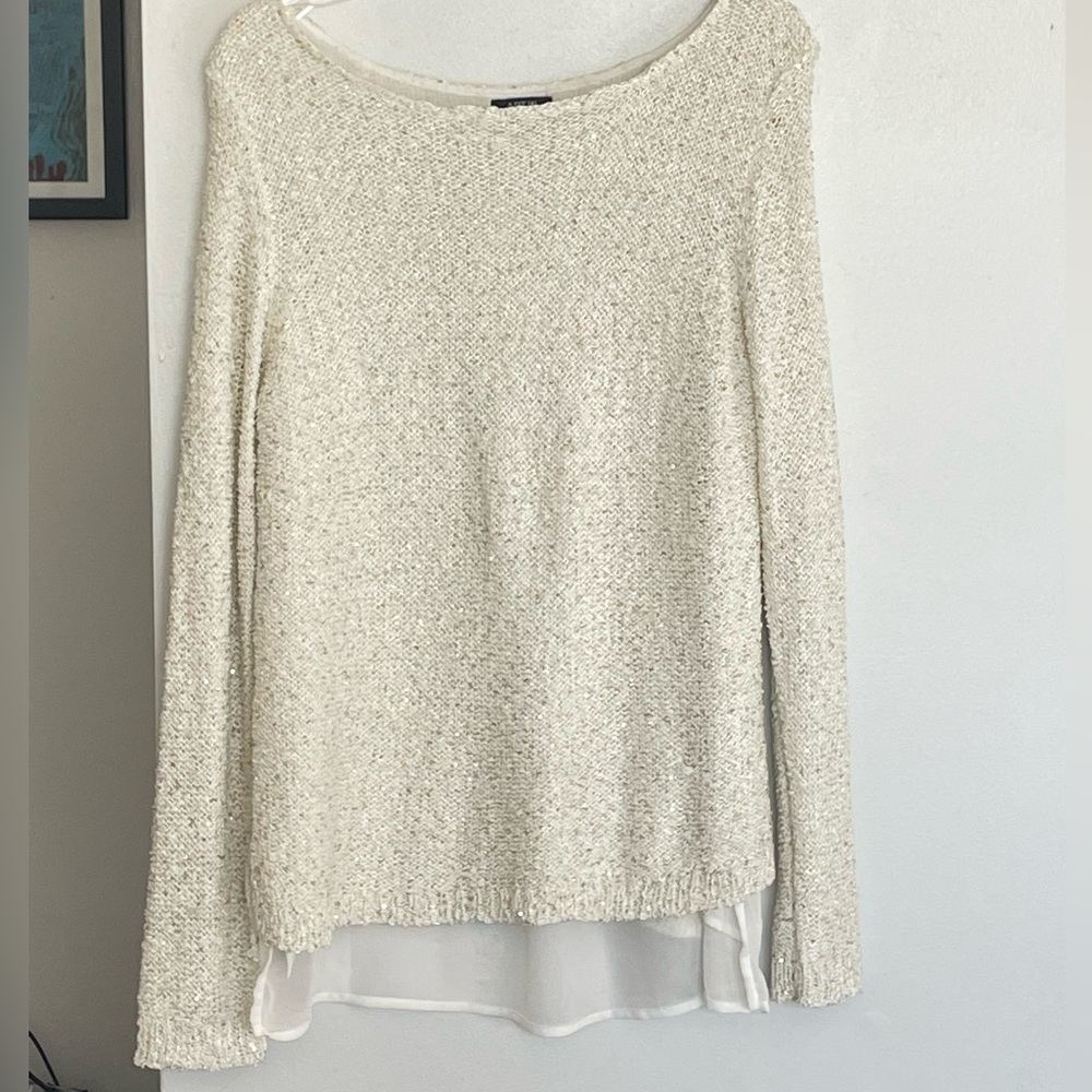 sparkly white sweater